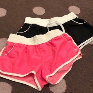 Two pairs of swim shorts
